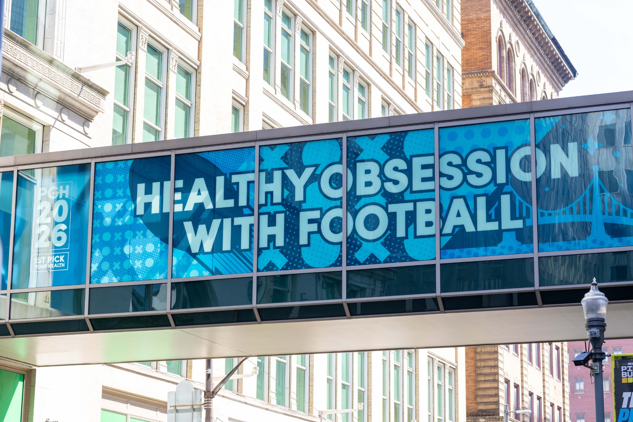 Highmark Healthy Obsession with Football skybridge in downtown Pittsburgh